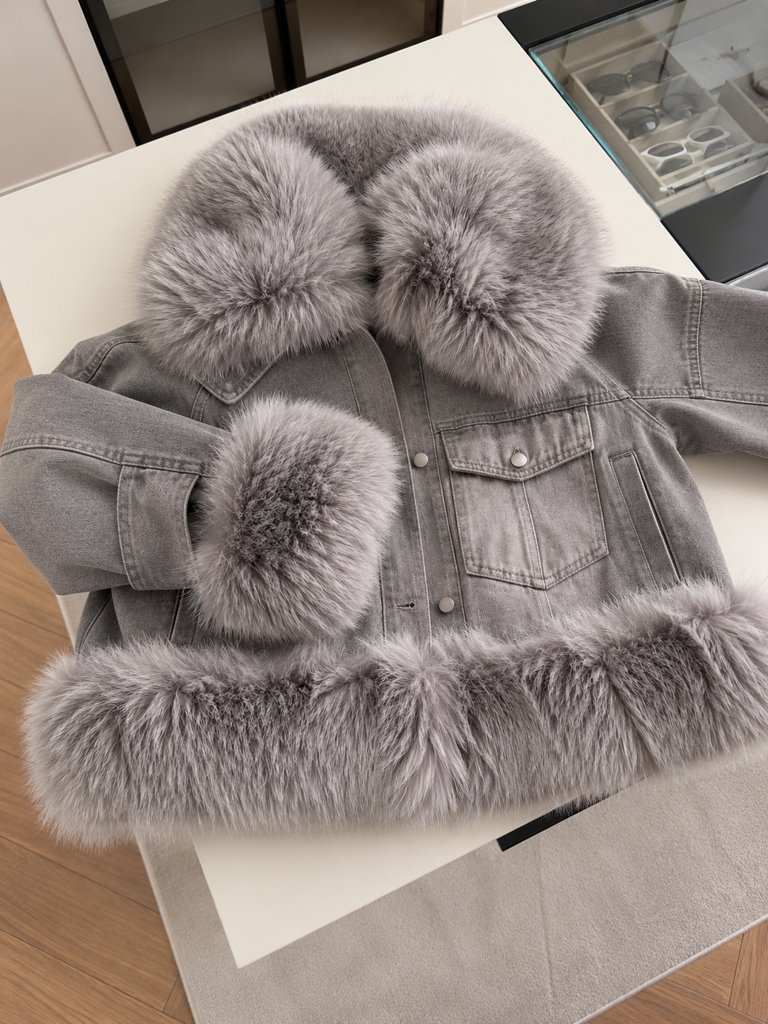 Denim jacket with voluminous faux fur trim on the large collar and cuffs