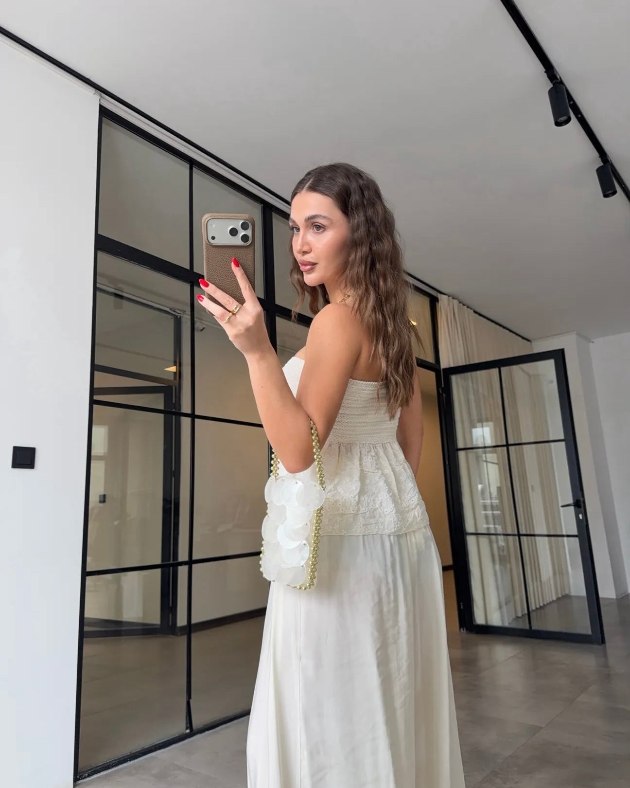 Embroidered knotted strapless blouse
