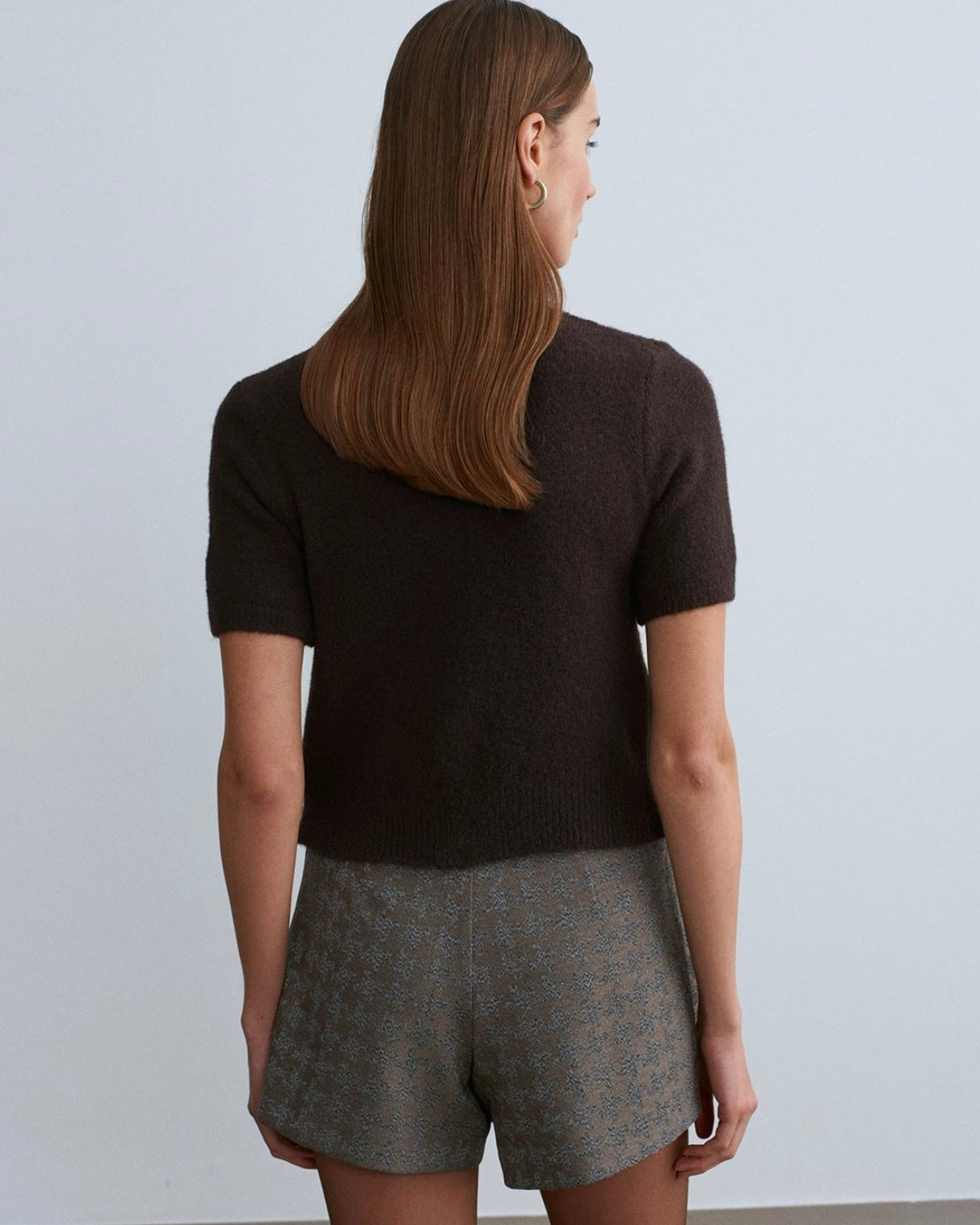 Belted pleated mini skirt