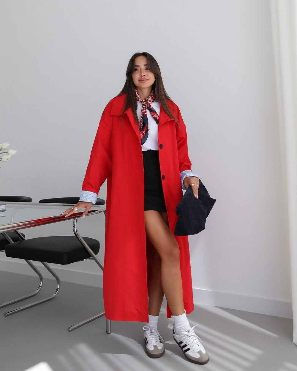 Red trench coat with fold-up sleeve detail