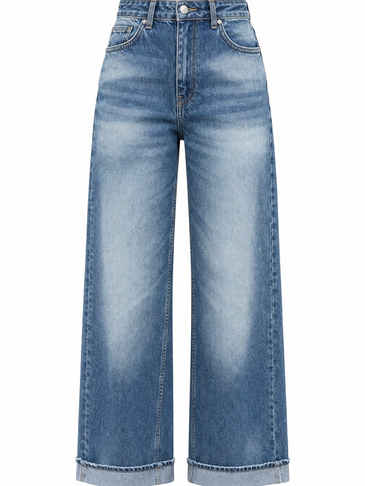Wide-leg blue jeans with a faded wash and folded hems