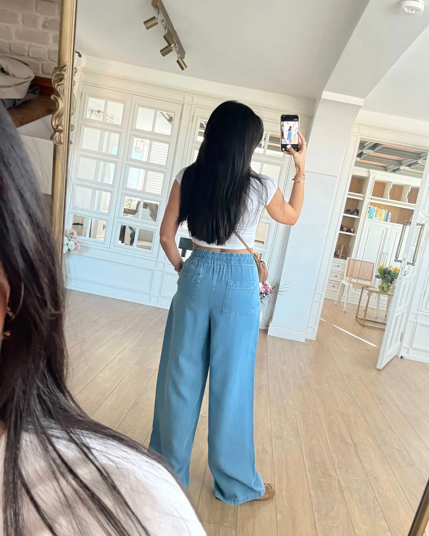 Baggy jeans with decorative pockets and tie-up closure