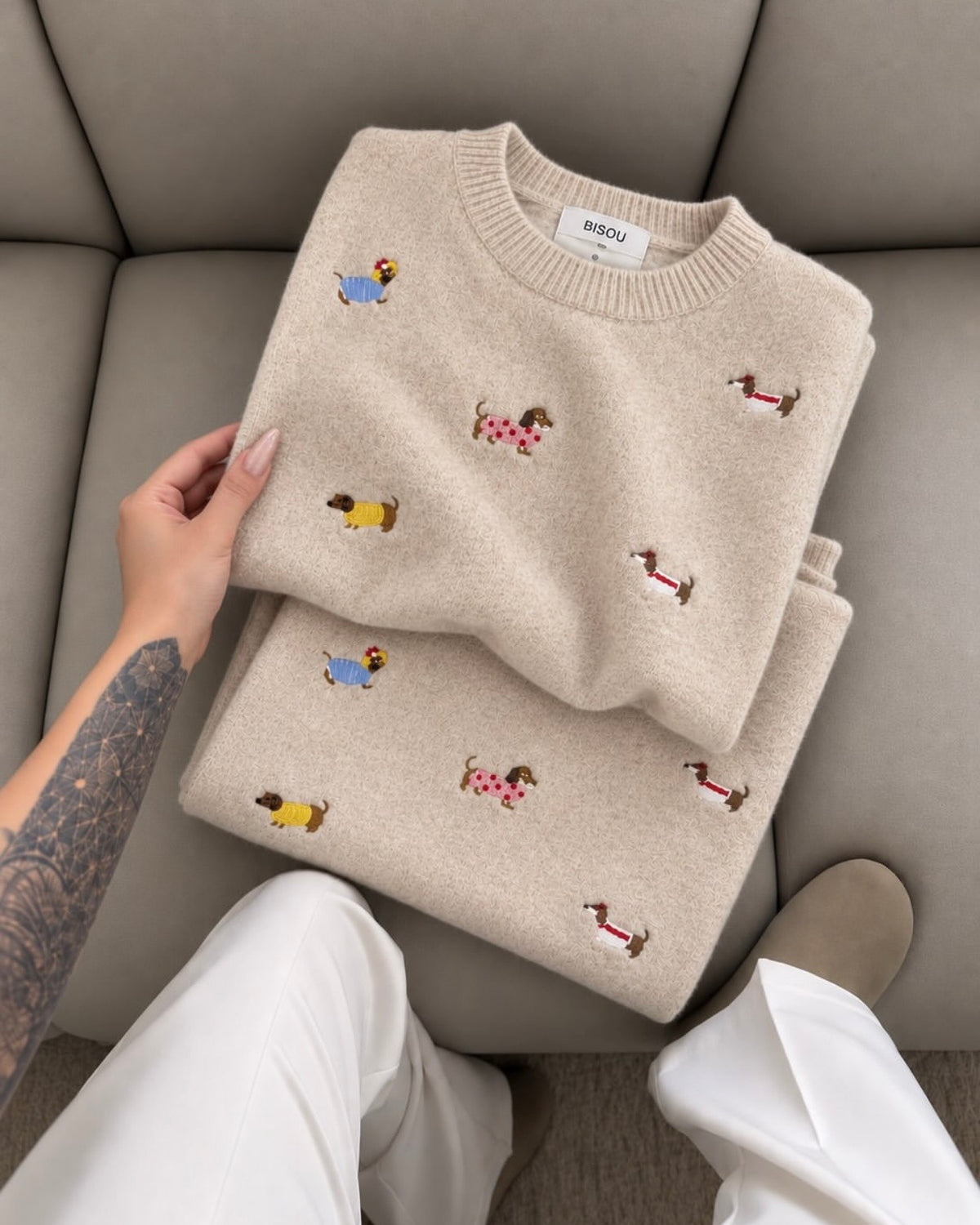 Crewneck sweater features playful little dachshund
