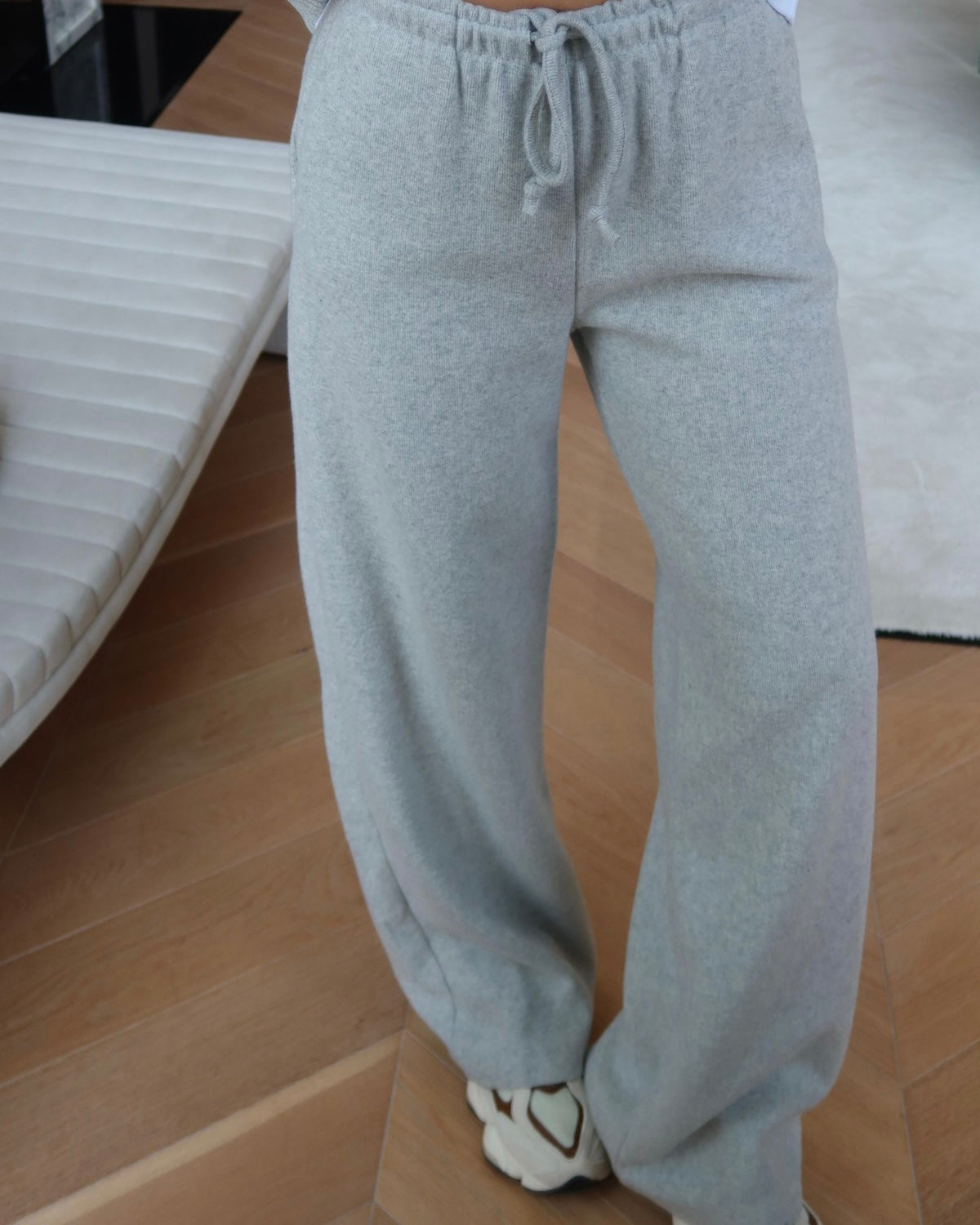 Crewneck sweatshirt paired with comfortable wide-leg trousers.