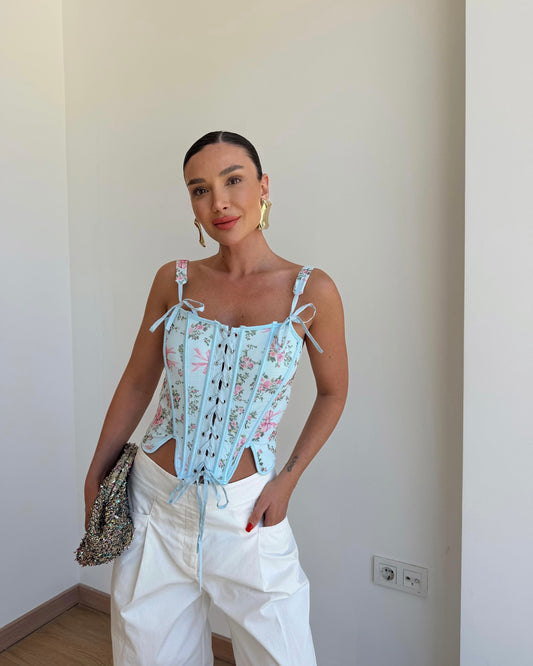 Floral patterned corset blouse.