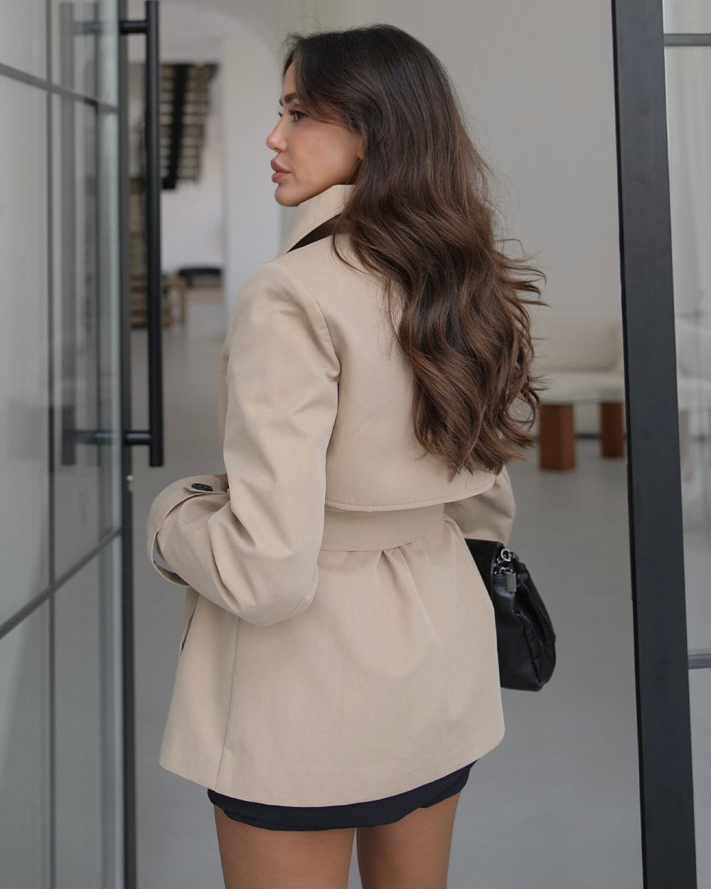 Beige windbreaker trench coat with belt detail