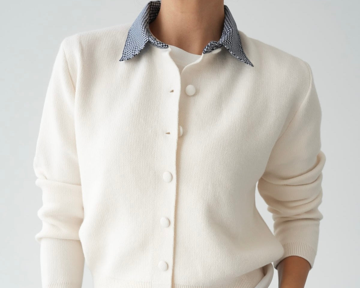 Knit cardigan with navy and white gingham patterned collar