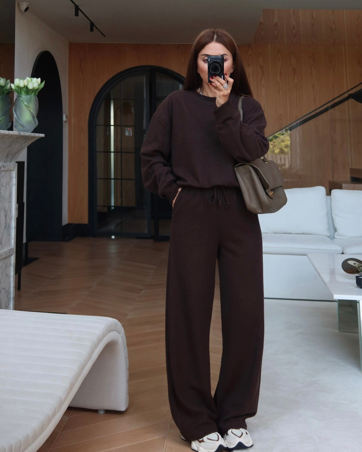 Crewneck sweatshirt paired with comfortable wide-leg trousers.