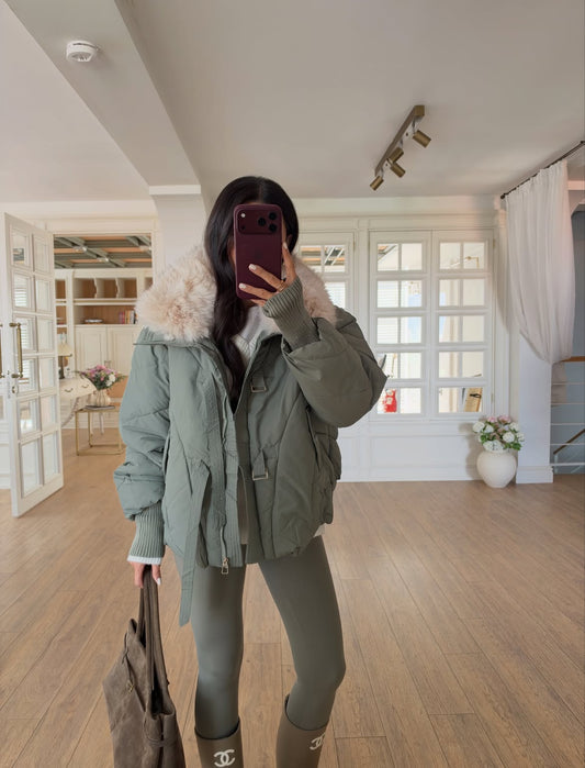 Sage green puffer jacket with a large plush fur collar