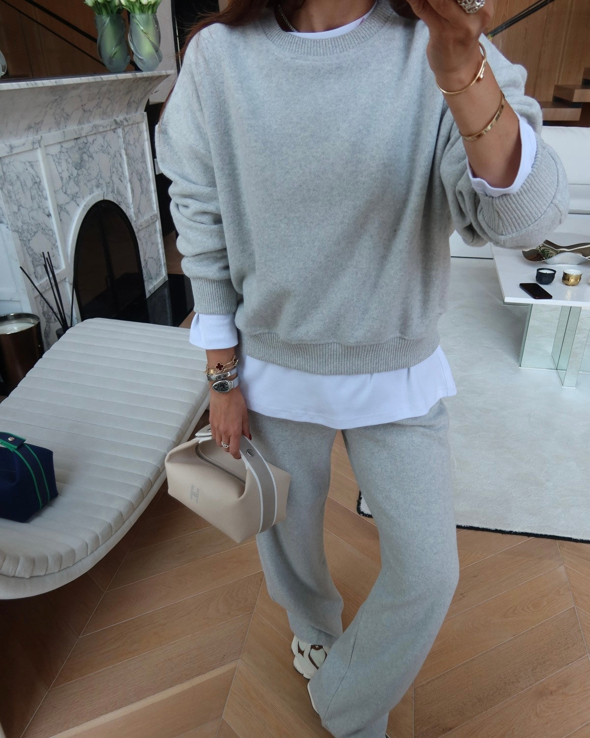 Crewneck sweatshirt paired with comfortable wide-leg trousers.