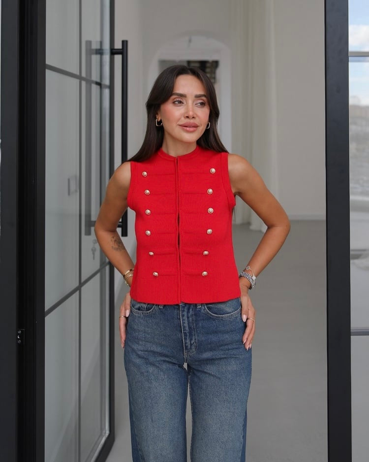 Knitted vest with decorative buttons