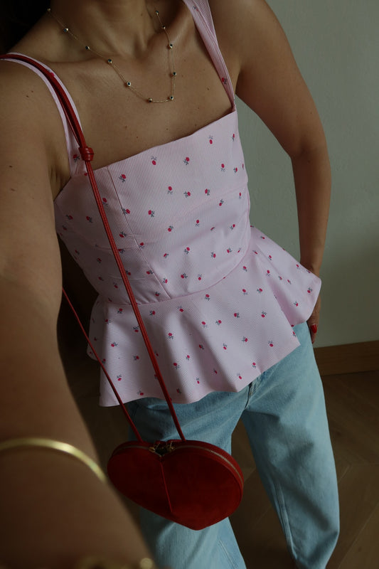 Pink floral peplum top