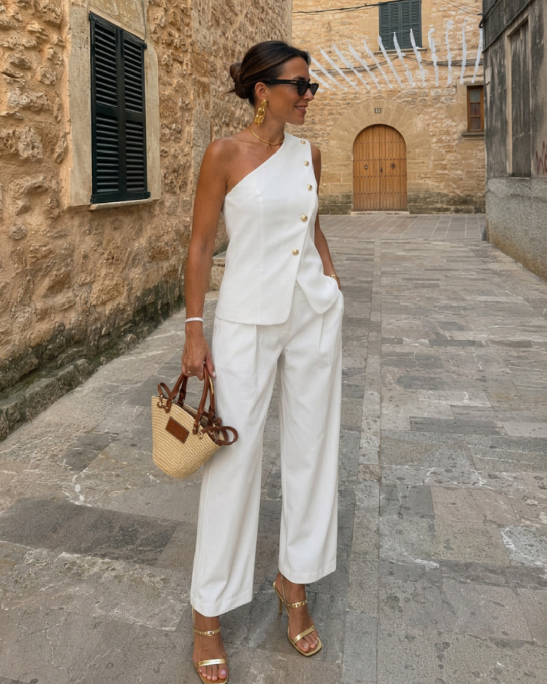 One-shoulder structured top with     High-waisted wide-leg trousers
