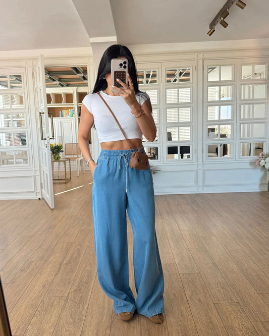 Baggy jeans with decorative pockets and tie-up closure