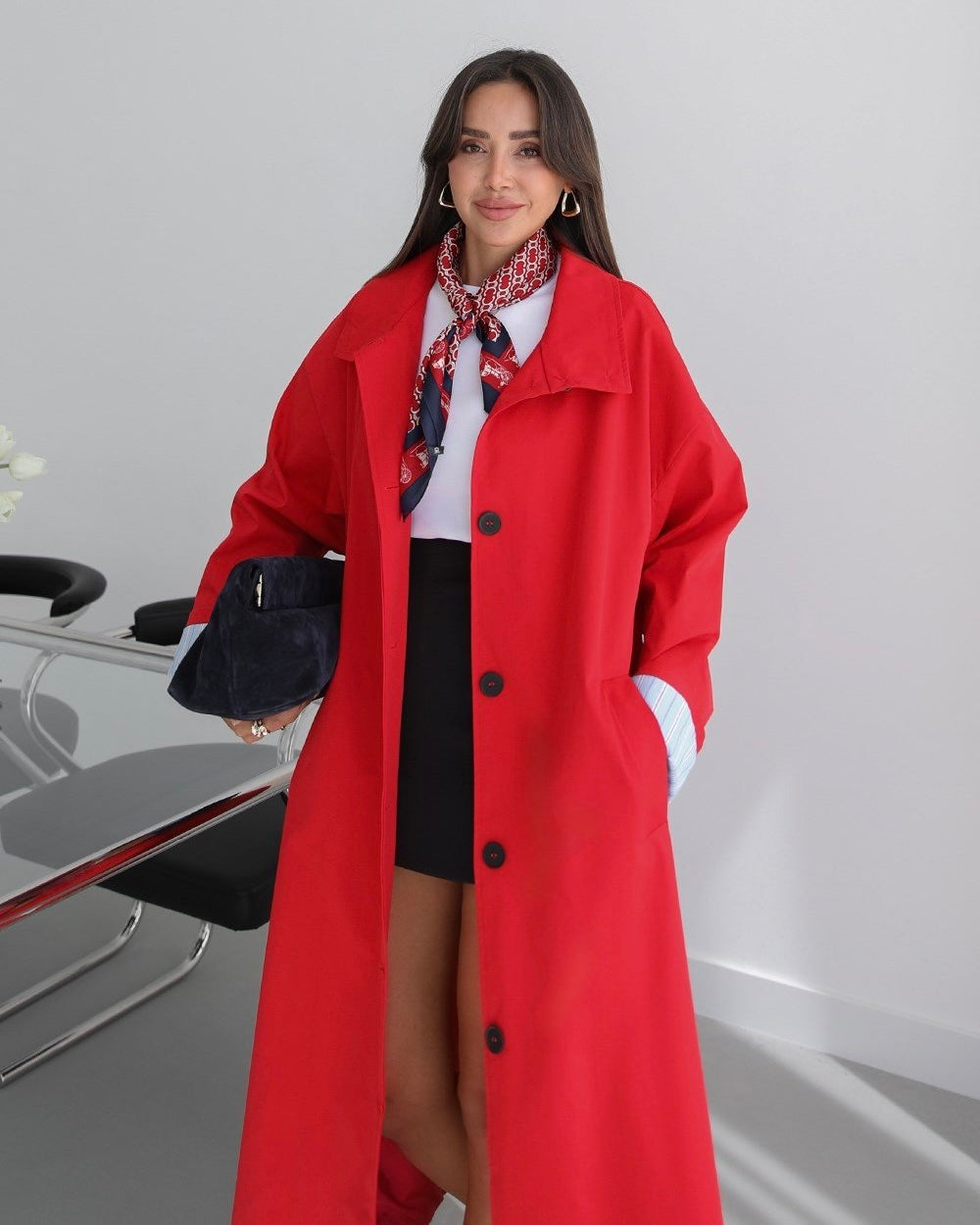Red trench coat with fold-up sleeve detail