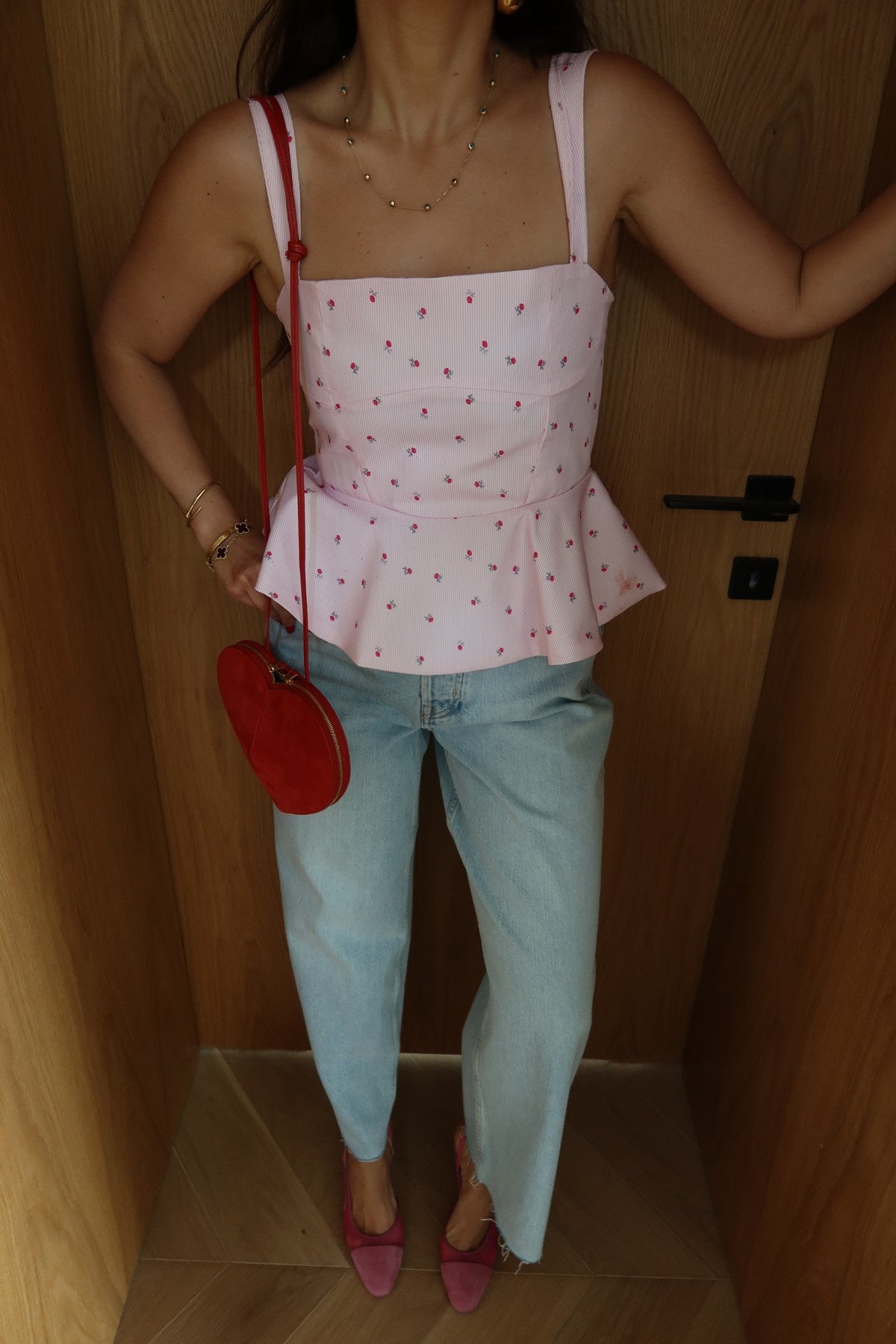 Pink floral peplum top