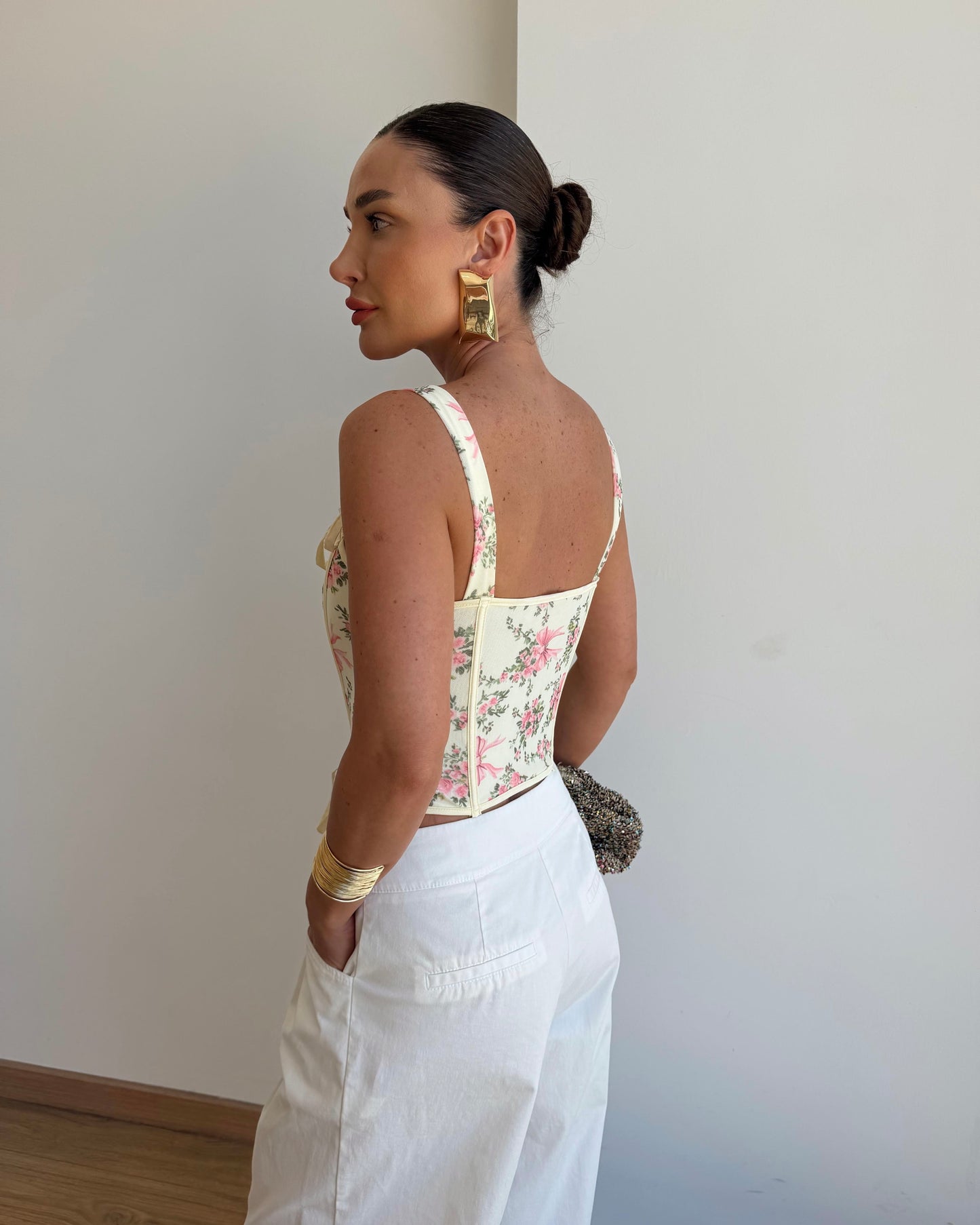 Floral patterned corset blouse.
