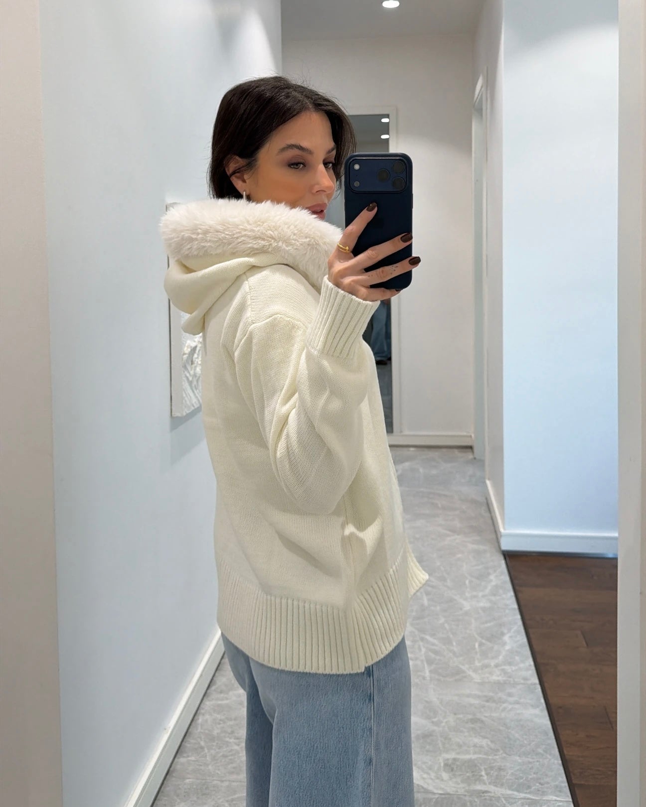 knit sweater with a chic faux-fur collar