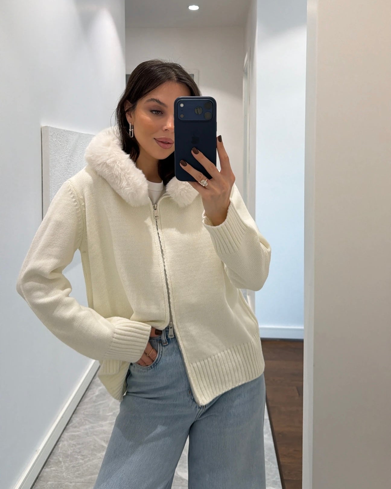 knit sweater with a chic faux-fur collar