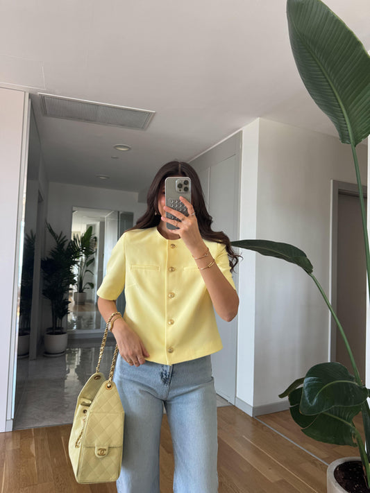 Short sleeve gold buttoned jacket