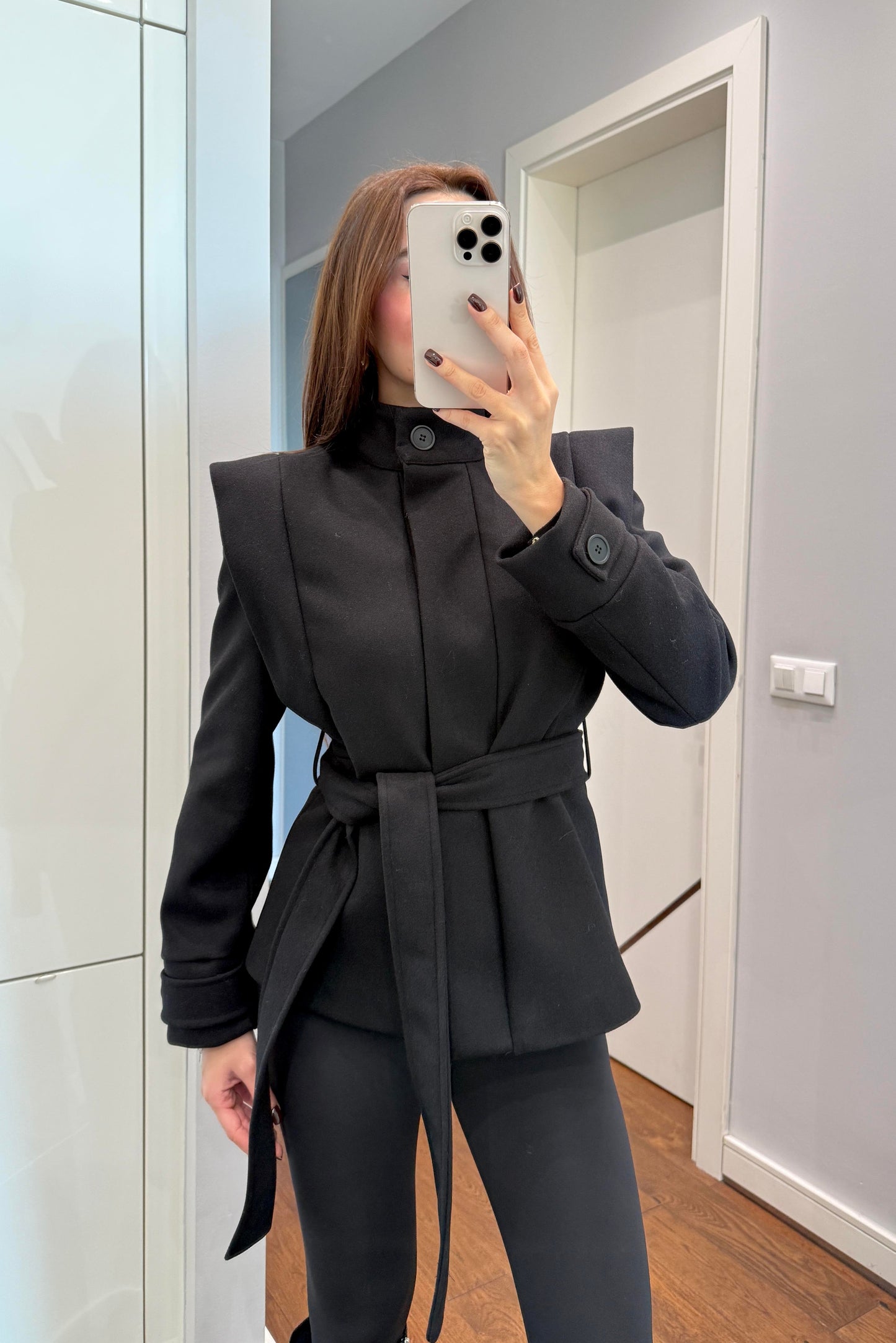 Padded, cached, belted jacket